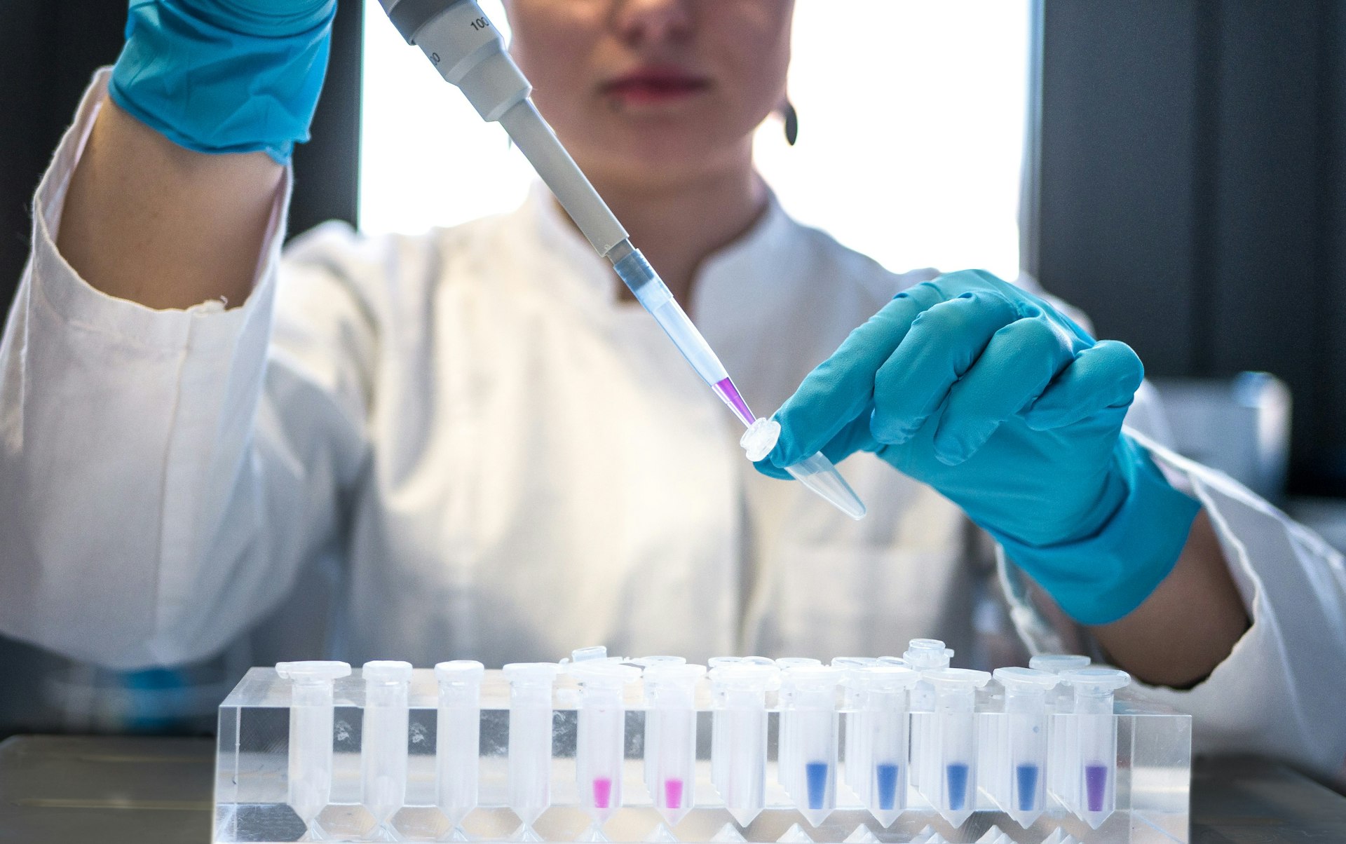 Laboratory technician testing chemical samples